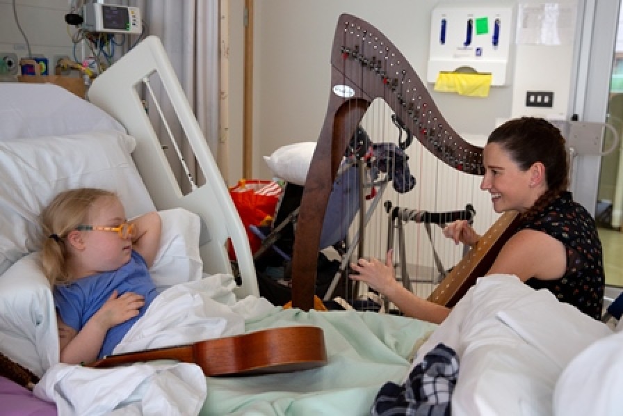 Musician Elfair with patient on Cardiac Ward